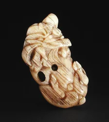 Netsuke que representa un jabalí reclinado, c. 1750-80